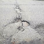 Pothole on Road at 1785 Central Ave