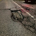 Pothole on Road at 5525 Riverside Dr E