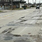 Pothole on Road at 2555 College Ave