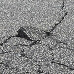 Pothole on Road at 1699 St Clair Ave