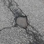 Pothole on Road at 885 Lawrence Rd