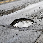Pothole on Road at 2199 Chrysler Centre