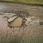 Pothole on Road at 1160 Central Ave