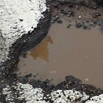 Pothole on Road at 2199 Chrysler Centre