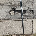 Pothole on Road at 108 Hanna St E