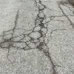 Pothole on Road at 1038 Jarvis Ave