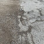 Pothole on Road at 1036 Jarvis Ave