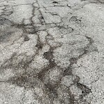 Pothole on Road at 1036 Jarvis Ave