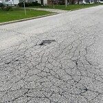 Pothole on Road at 10990 Eastcourt Dr