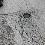 Pothole on Road at 1212 Monmouth Rd