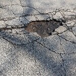 Pothole on Road at 3662 Wildwood Dr