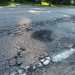 Pothole on Road at 3626 Howard Ave