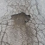 Pothole on Road at 3200 Mark Ave