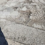 Pothole on Road at 2403 Chandler Rd