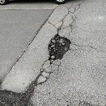 Pothole on Road at 97441 Marentette Ave