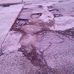 Pothole on Road at 2380 Walker Rd