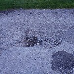 Pothole on Road at 3005 Radisson Ave