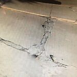 Pothole on Road at 1667 Howard Ave