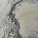 Pothole on Road at 1155 Central Ave