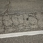 Pothole on Road at 1711 Parent Ave